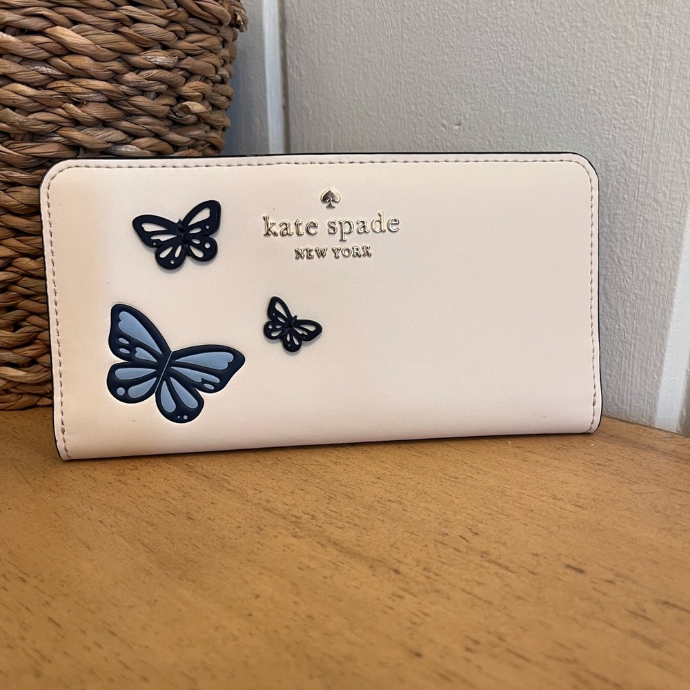 Kate Spade Cream Wallet with Blue Butterfly Accents